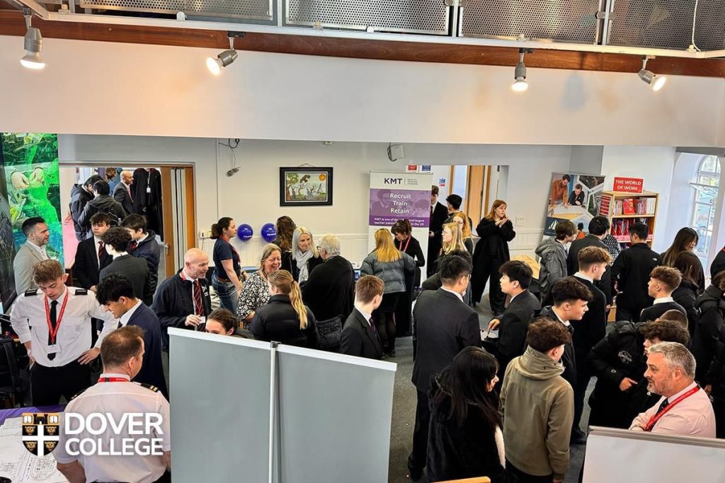 Dover College careers fair in the LRC where Stockley and Turner presented alongside attendees including the UK Ministry of Defence (MoD) and the European Space Agency (ESA).